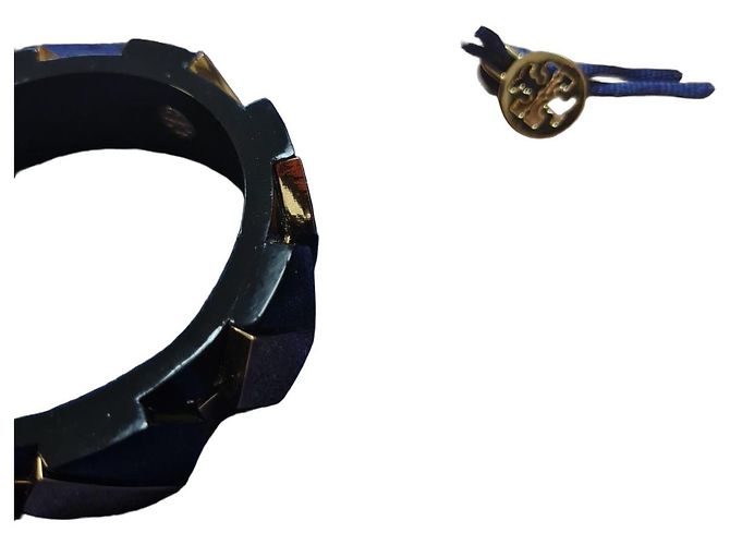 Tory Burch Bracciale rigido geometrico nero e oro D'oro