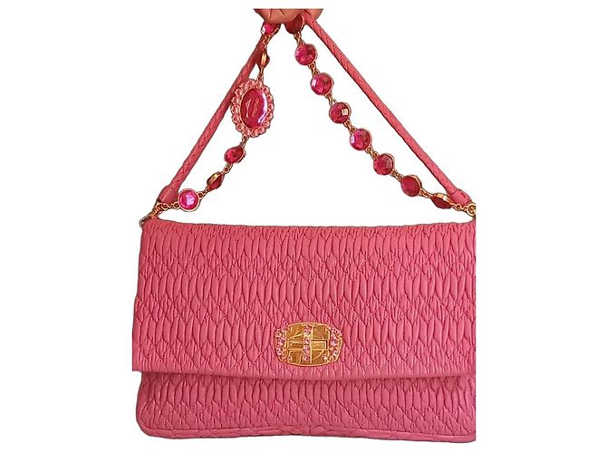 Mala de mão Miu Miu em couro acolchoado rosa com cristais
