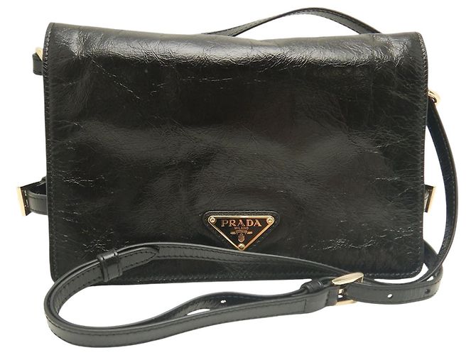 Borsa a tracolla Prada in pelle di vitello stropicciata nera Nero