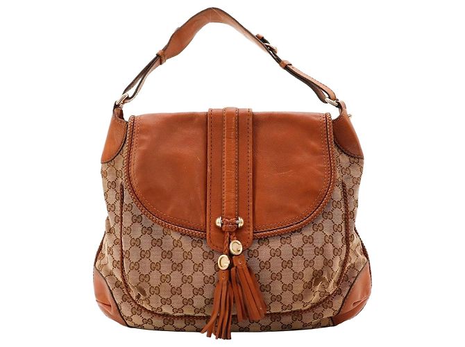 Gucci Bolsa de ombro GG Supreme em canvas com monograma e couro
