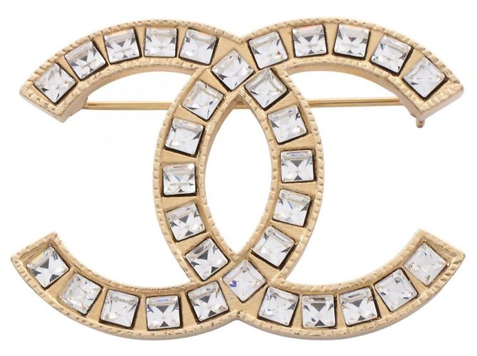 Spilla Chanel Coco Mark placcata oro D'oro