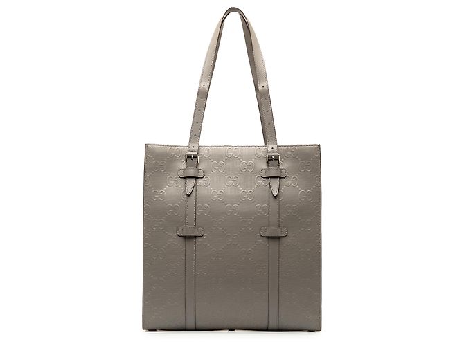 Tote vertical em couro com relevo GG cinza Gucci Marrom