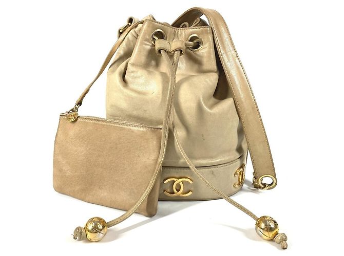 Chanel Vintage Triple Coco CC Logo Drawstring Bag Beige