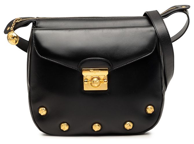 Salvatore Ferragamo Bolsa transversal Ferragamo em couro preto com tachas