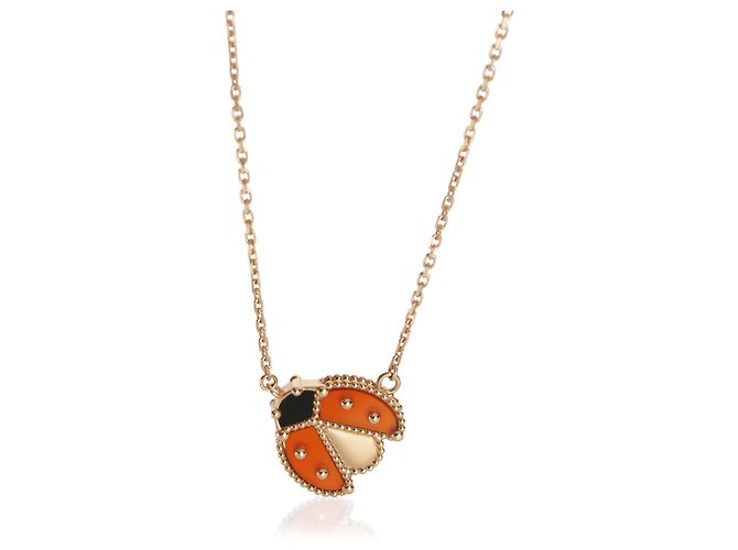 Pendente Lucky Spring in oro rosa, cornola e onice di Van Cleef & Arpels 