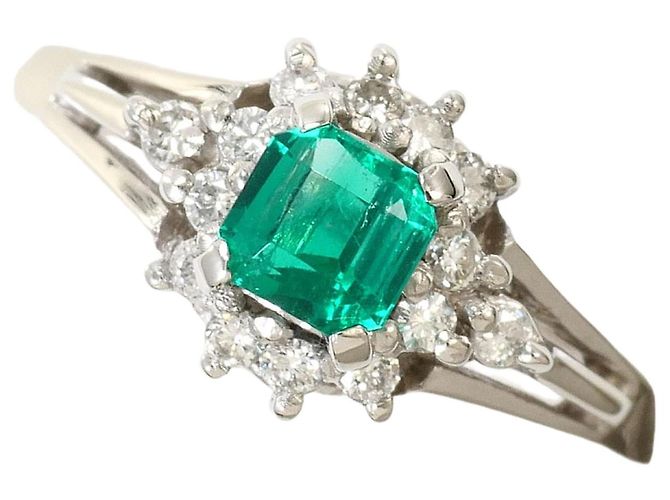Autre Marque Platin-Ring mit Diamant und Smaragd