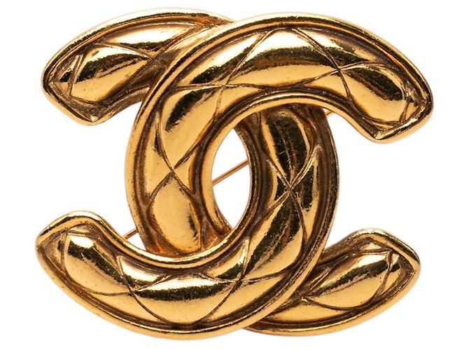 Spilla Chanel Coco Mark placcata oro D'oro