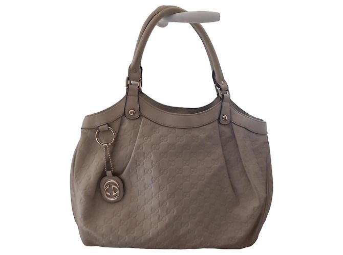 Gucci Handtasche aus beigem Leder mit GG Monogramm
