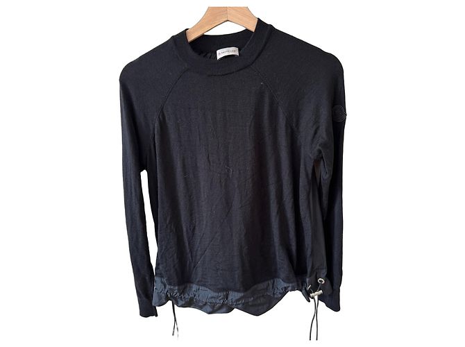 Moncler Oberteil aus schwarzer Wollstrickware und Nylon mit Kordelzug