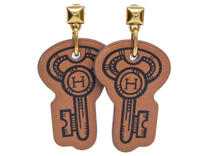 Hermès Orecchini pendenti in pelle e metallo Hermes H Curiosité Cre Marrone