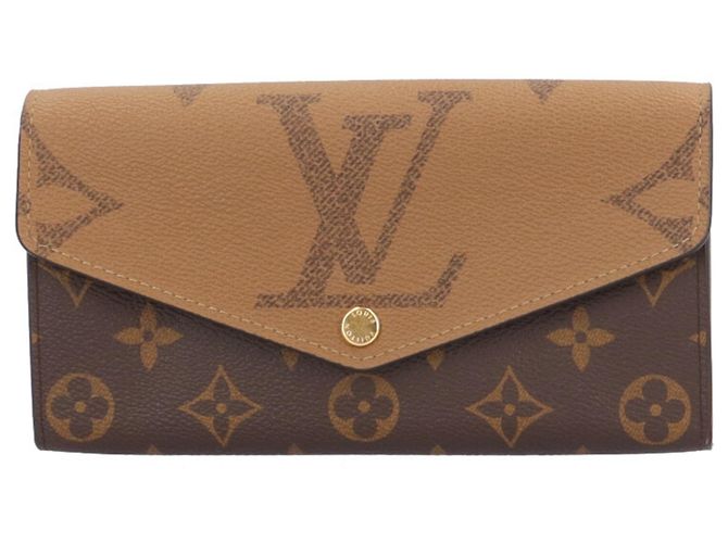 Cartera larga Louis Vuitton Sarah Monogram Giant Reverse Castaño