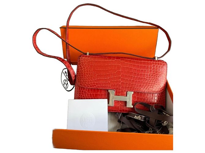 Bolsa Hermès Constance Elan 24 em couro de crocodilo vermelho