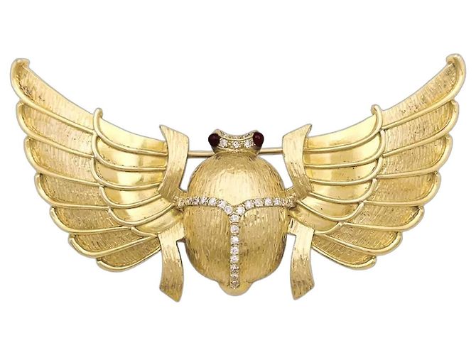 Autre Marque Spilla "Scarabée" in oro giallo, diamanti e rubini.