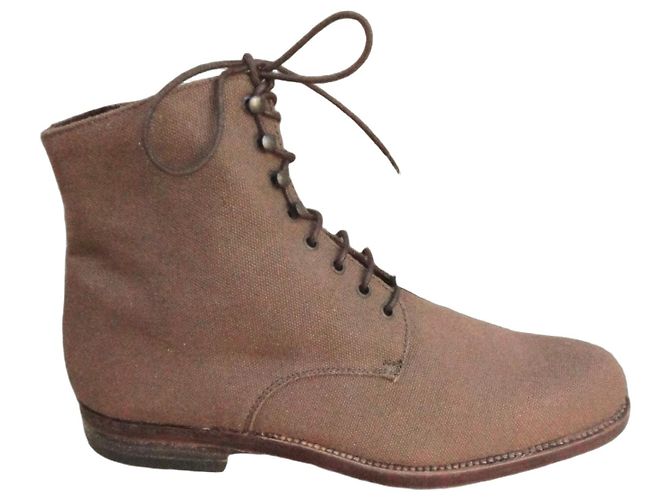 Botas Jil Sander em lona e couro estado novo Marrom