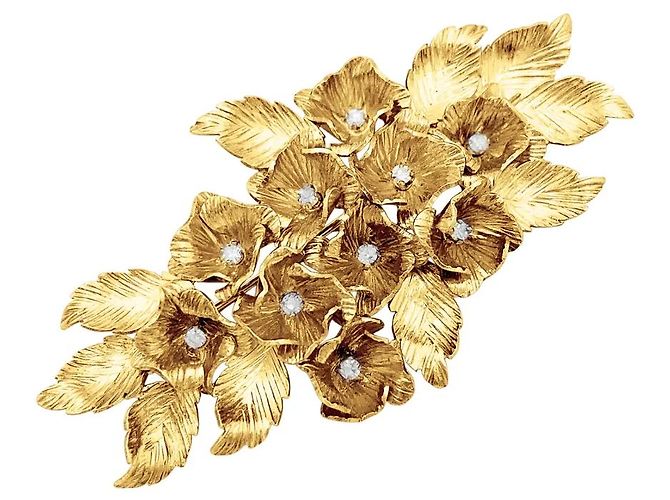 Autre Marque Spilla "Fleurs", oro giallo e diamanti.