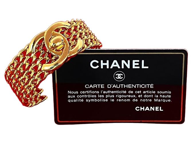 Timeless Bracciale rigido Chanel Coco Mark Turnlock D'oro 