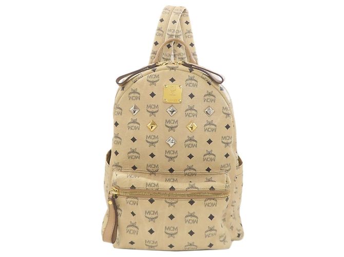 Mochila MCM com estampa total e tachas Bege
