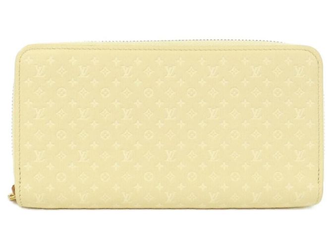 Louis Vuitton Nanogram Zippy Wallet Yellow