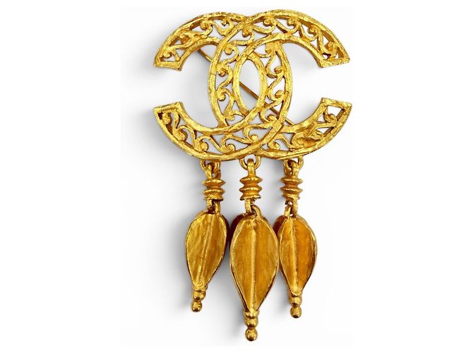 Broche Chanel Vintage 95A Coco Mark Dorado
