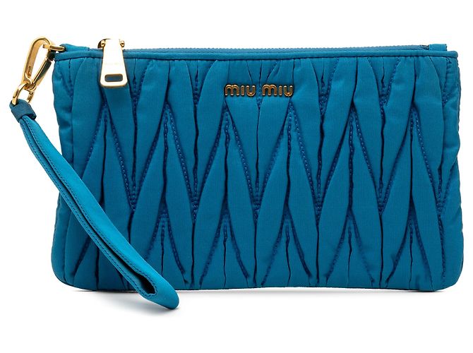 Clutch de nylon matelassé azul Miu Miu