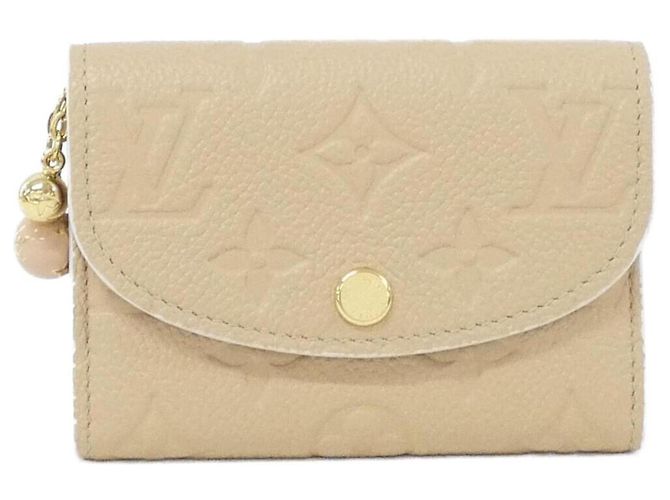 Monedero Monogram Empreinte Louis Vuitton Beige