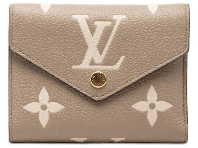 Portafoglio Louis Vuitton Beige Monogram Empreinte Giant Victorine