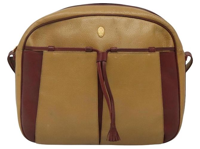 Must de Cartier em couro com pompom Bege
