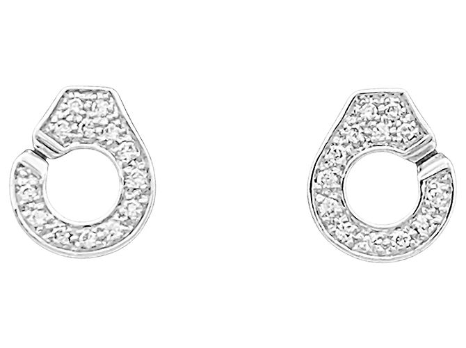 Orecchini Dinh Van, "Manette" in oro bianco e diamanti.