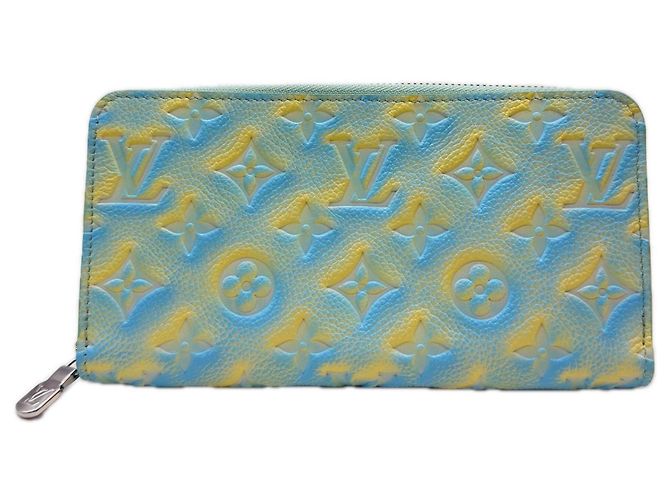 Cartera Zippy Monogram Empreinte Louis Vuitton Azul Amarillo