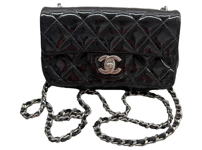 Bolso Chanel Classic Flap Mini de charol Negro