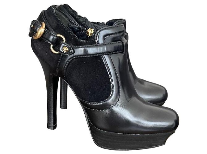 Gucci Botas de plataforma em couro preto e camurça