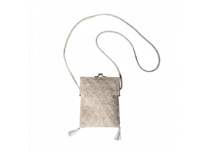 Autre Marque Olga Berg Clutch con perline e nappe Bianco