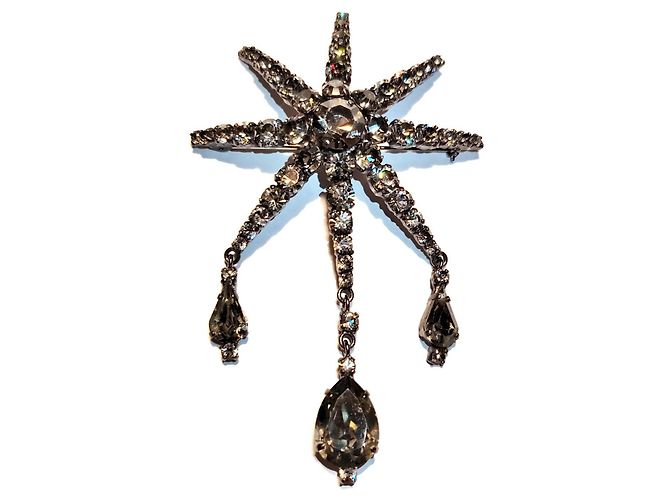 Broche Rochas Paris Starburst em strass Preto