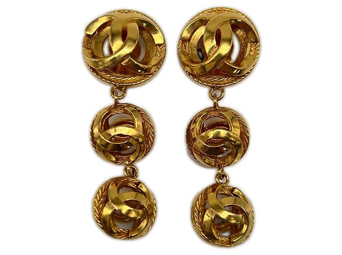 Timeless Pendientes de clip redondo Chanel Coco Mark Dorado