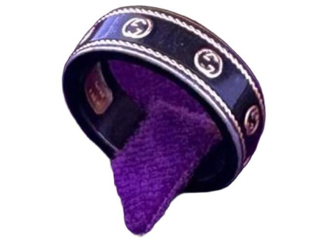 Anello Interlocking G Icon Band di GUCCI Nero D'oro