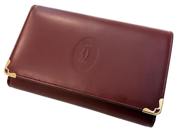 Cartera bi-fold Cartier Must en Bordeaux Burdeos