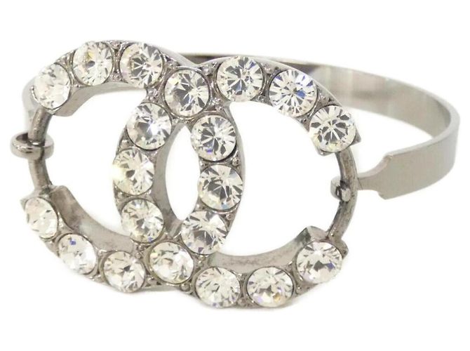 Bracciale rigido Chanel trasparente e argento 