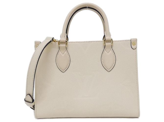 Bolsa Louis Vuitton Monogram Empreinte OnTheGo PM Bege