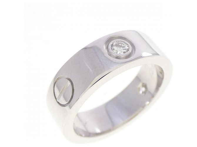 Anillo Cartier Love con medio diamante