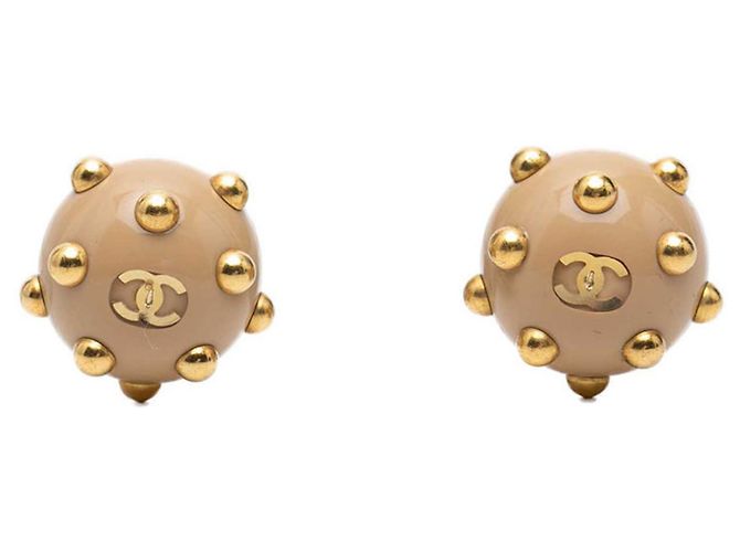 Orecchini a clip Vintage Chanel Coco Mark Beige D'oro