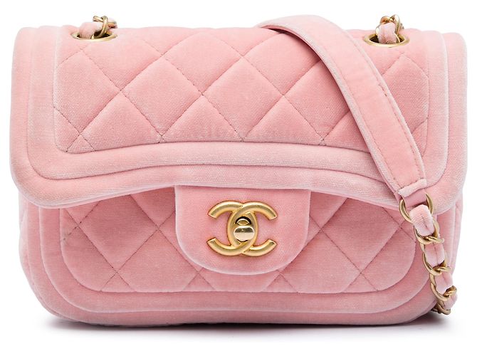 Chanel Mini Flap em veludo acolchoado rosa com fecho duplo