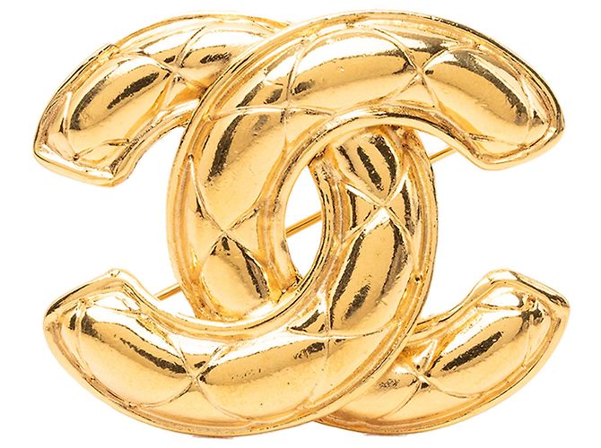 Broche Chanel Gold CC acolchoada banhada a ouro Dourado