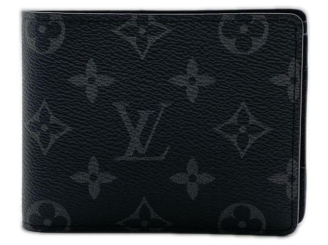 Cartera bi-fold Louis Vuitton Monogram Eclipse Portefeuille Slender Castaño Negro