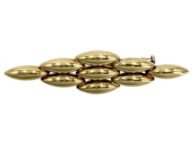 Spilla Cartier in oro giallo 18K