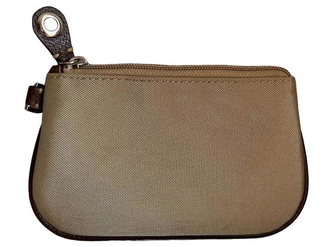 Lancel Clutch aus beigem Canvas und braunem Leder