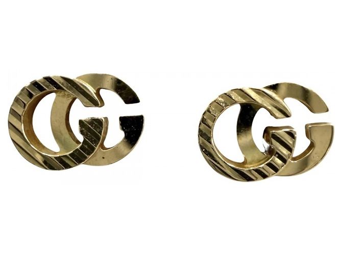 Pendientes de botón en oro amarillo de 18K Gucci