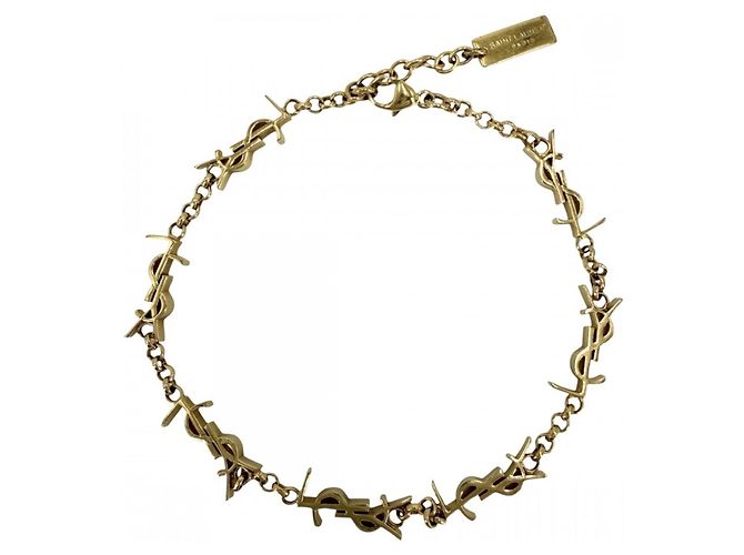 Cassandra Pulsera con charms dorada Saint Laurent Dorado