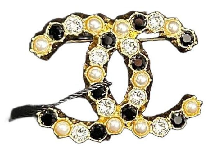 Chanel Spilla CC A20K Cristalli e Perle Nero Bianco D'oro Gold hardware