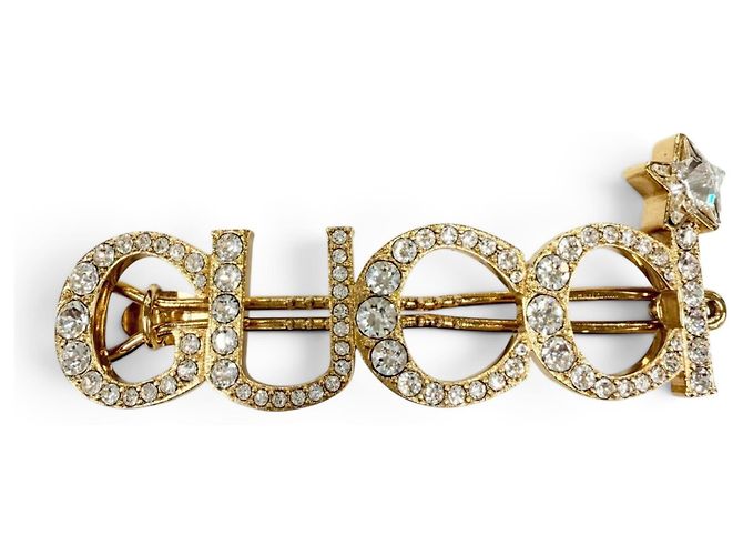 Clip per capelli Gucci con strass in oro e argento D'oro
