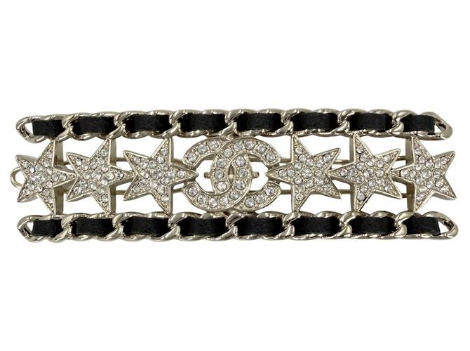 Barrette de cuero chapada en oro Chanel Negro Dorado